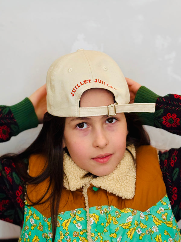 Back view of kids beige cotton baseball cap with Juillet Juillet embroidery